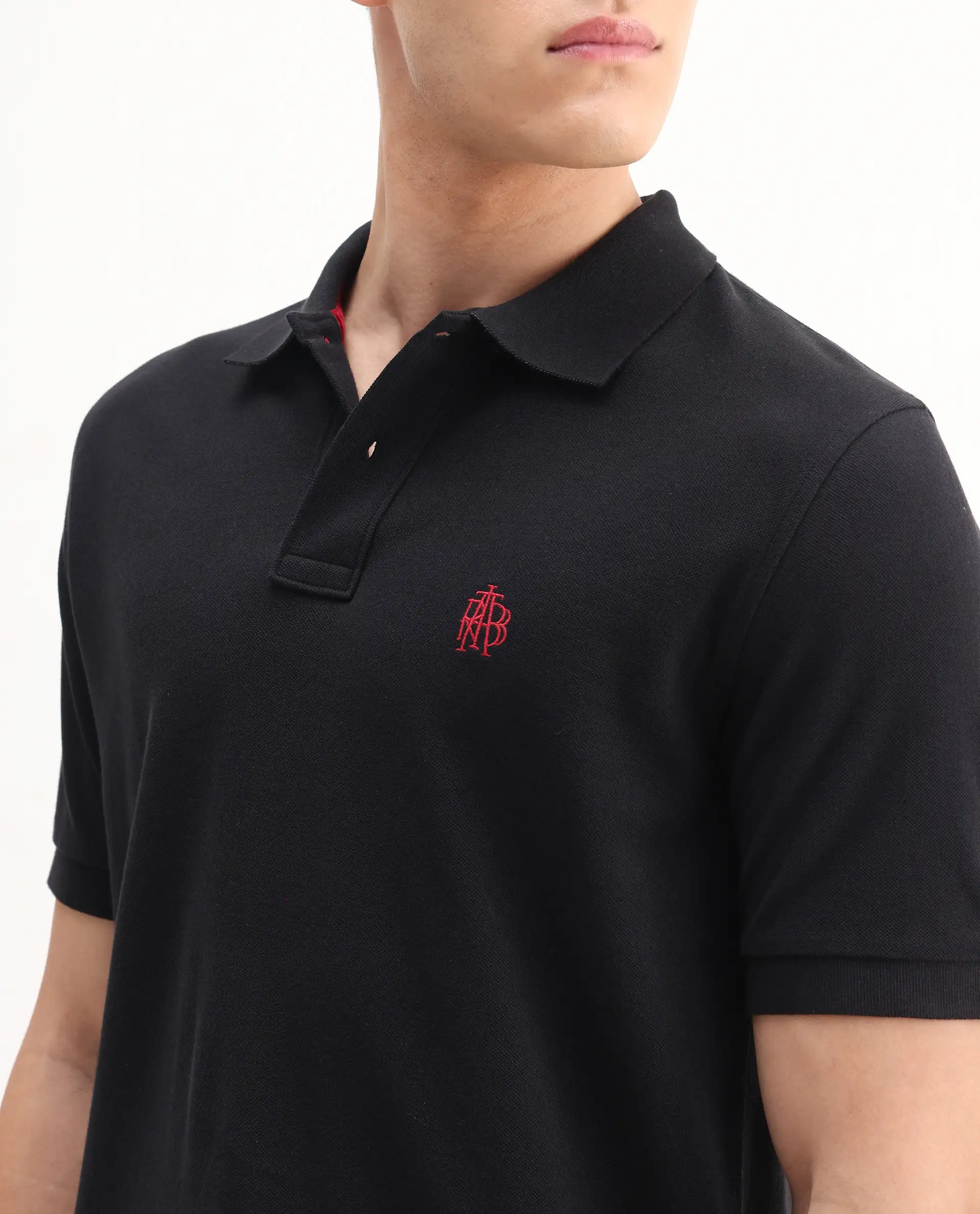 Rare Rabbit Men's Pare-1 Black Cotton Plain Regular Fit Half Sleeve Polo - Image 4