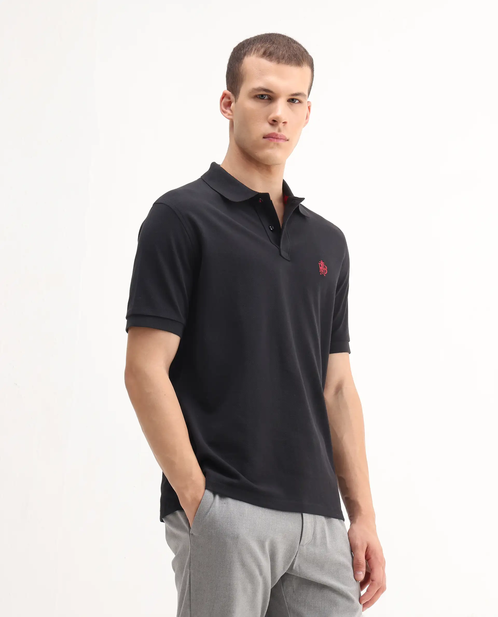 Rare Rabbit Men's Pare-1 Black Cotton Plain Regular Fit Half Sleeve Polo - Image 7