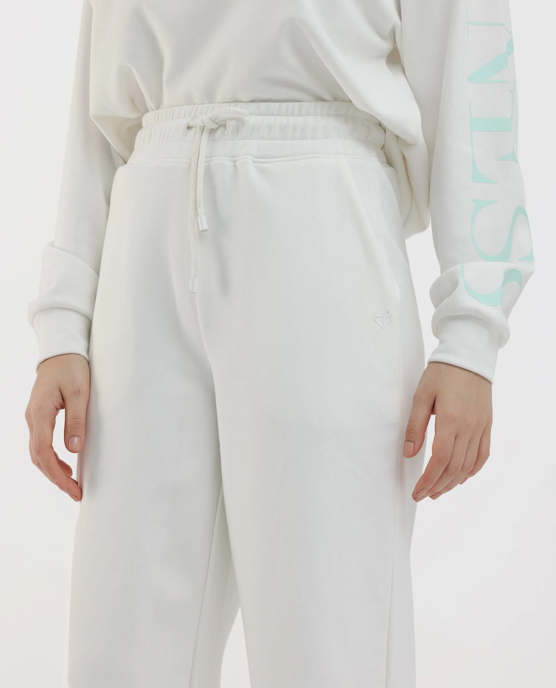 Rareism Women's Pazoo F1 Off White Cotton Blend Plain Ankle Length Flared Track Pant - Image 4