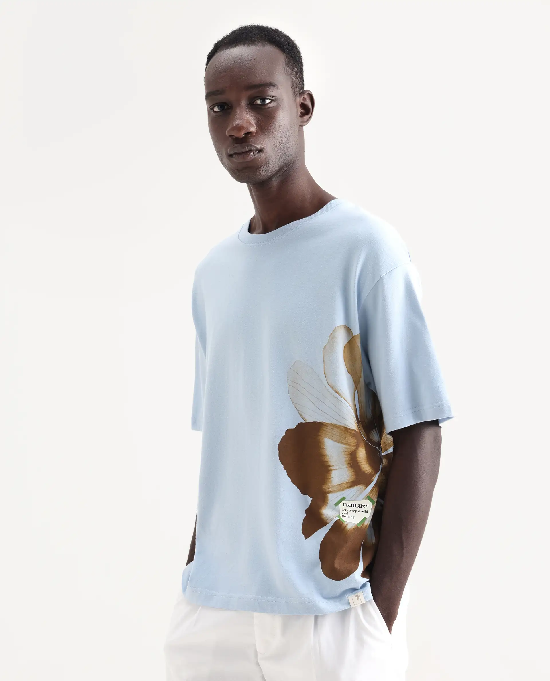 Rare Rabbit Men's Petas Light Blue Cotton Graphic Print Oversized Fit Half Sleeve Crew Neck T-Shirt - Image 5
