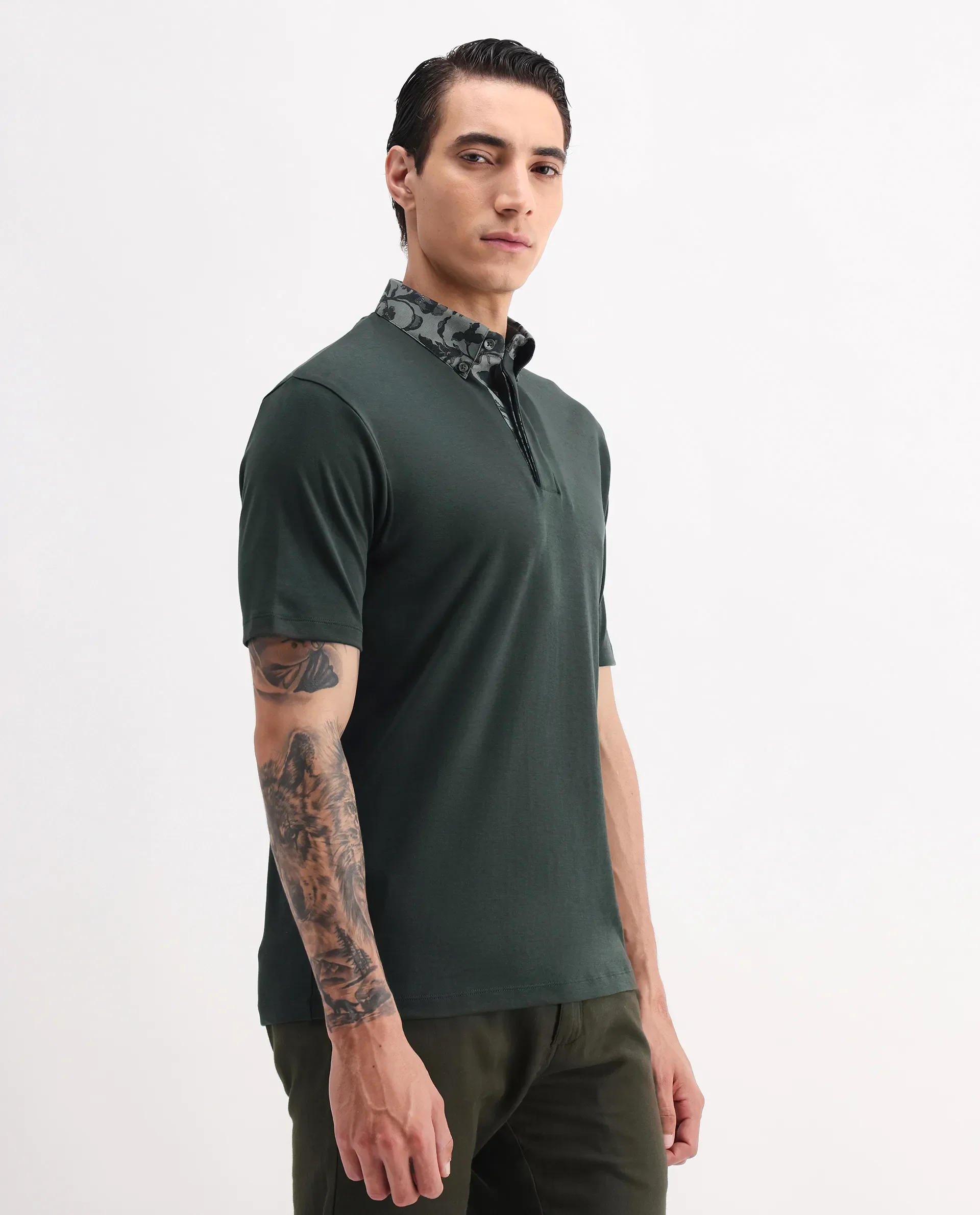 Rare Rabbit Men's Ringer-A25 Dark Green Cotton Plain Regular Fit Half Sleeve Polo - Image 6