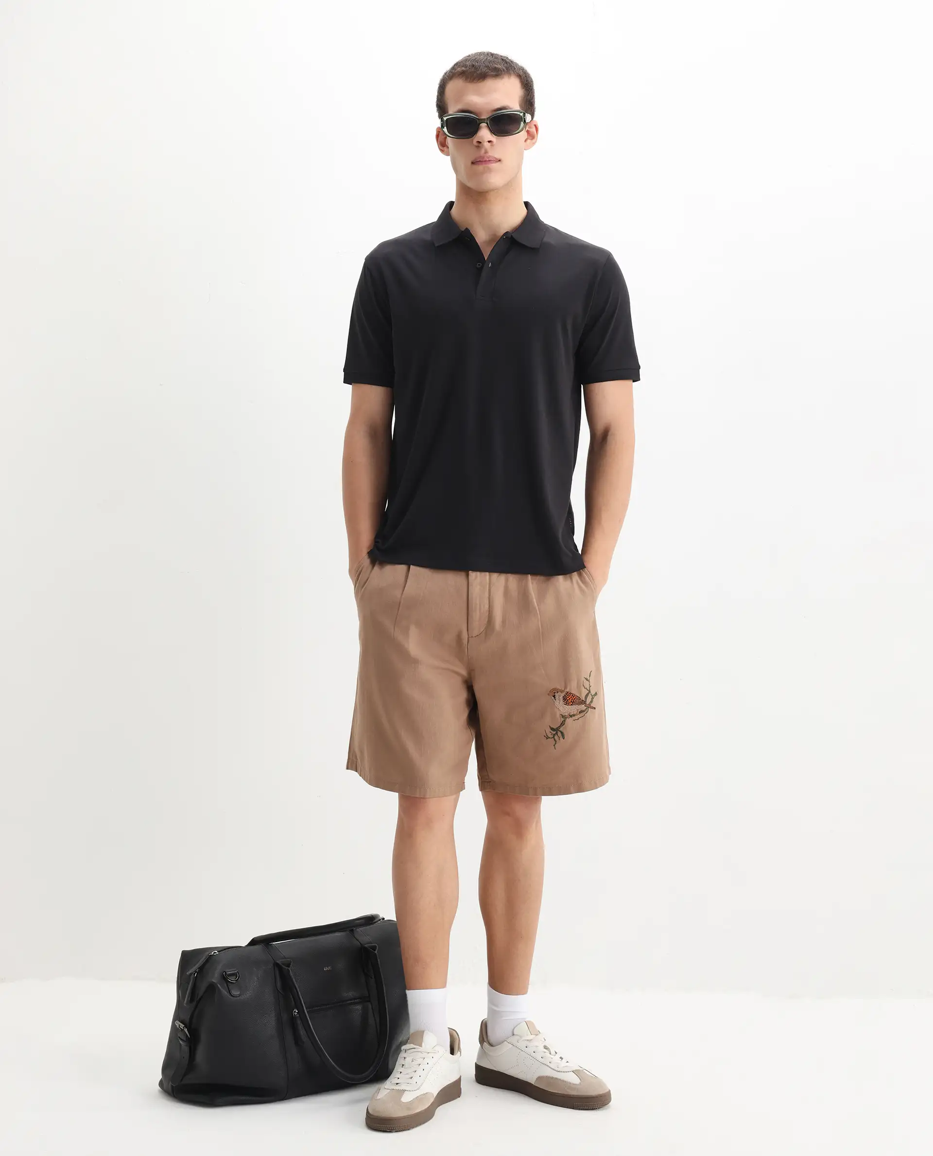 Rare Rabbit Men's Row-1 Black Cotton Plain Regular Fit Half Sleeve Polo - Image 2