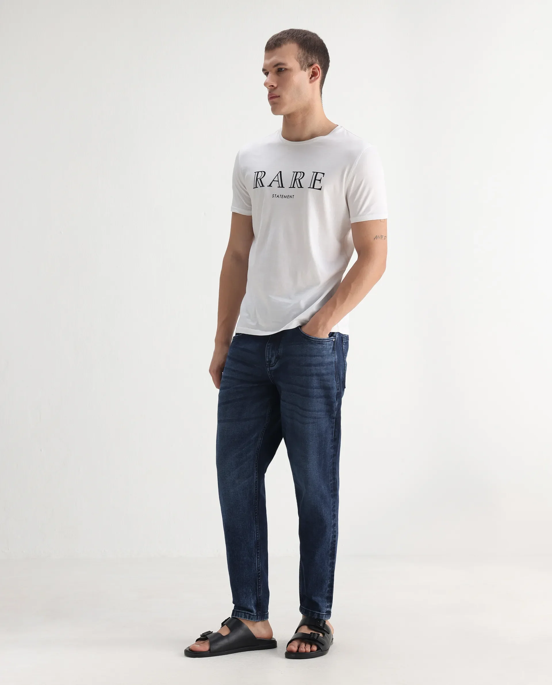 Rare Rabbit Men's Sam-2 Dusky Blue Cotton Plain Kurt Carrot Fit Jeans - Image 5