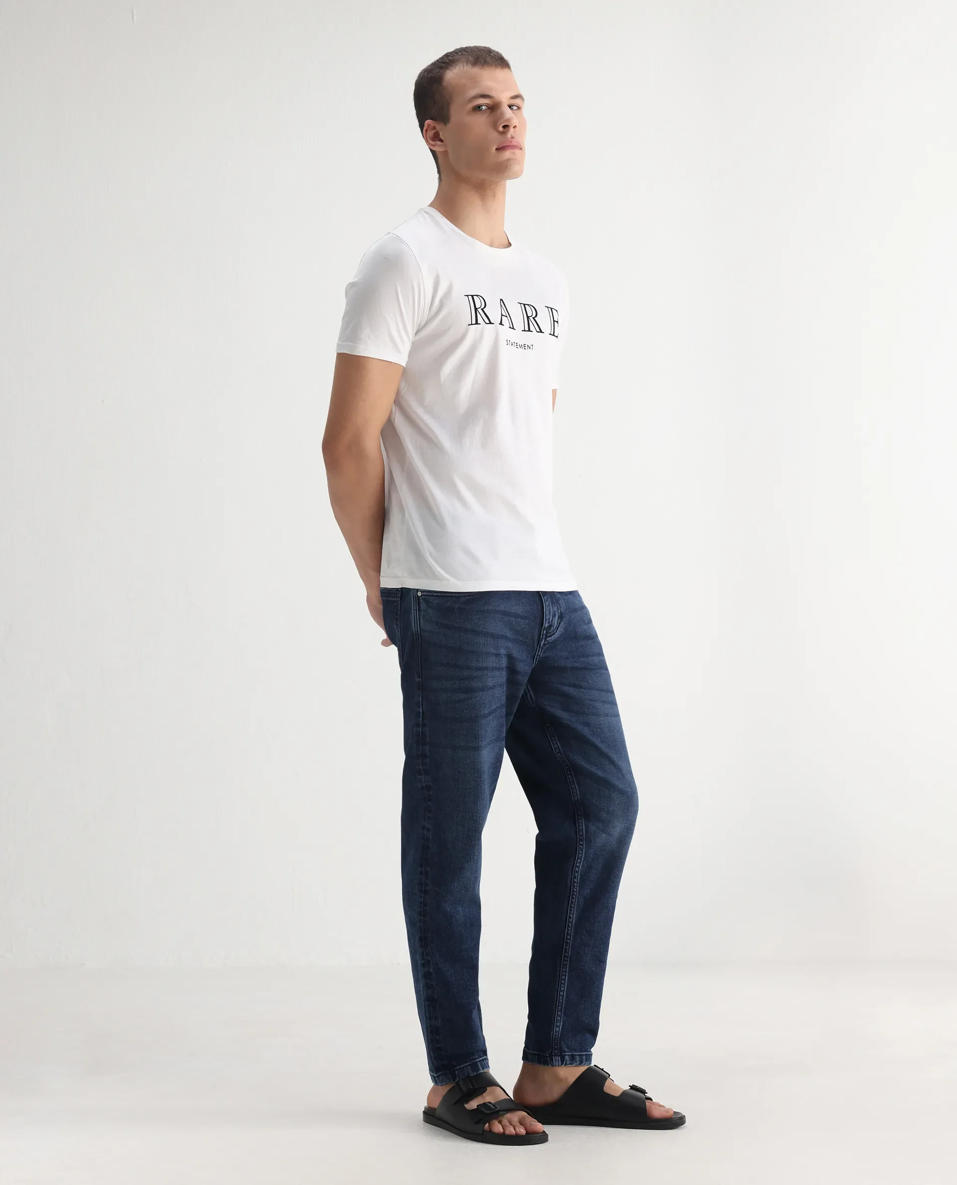Rare Rabbit Men's Sam-2 Dusky Blue Cotton Plain Kurt Carrot Fit Jeans - Image 7