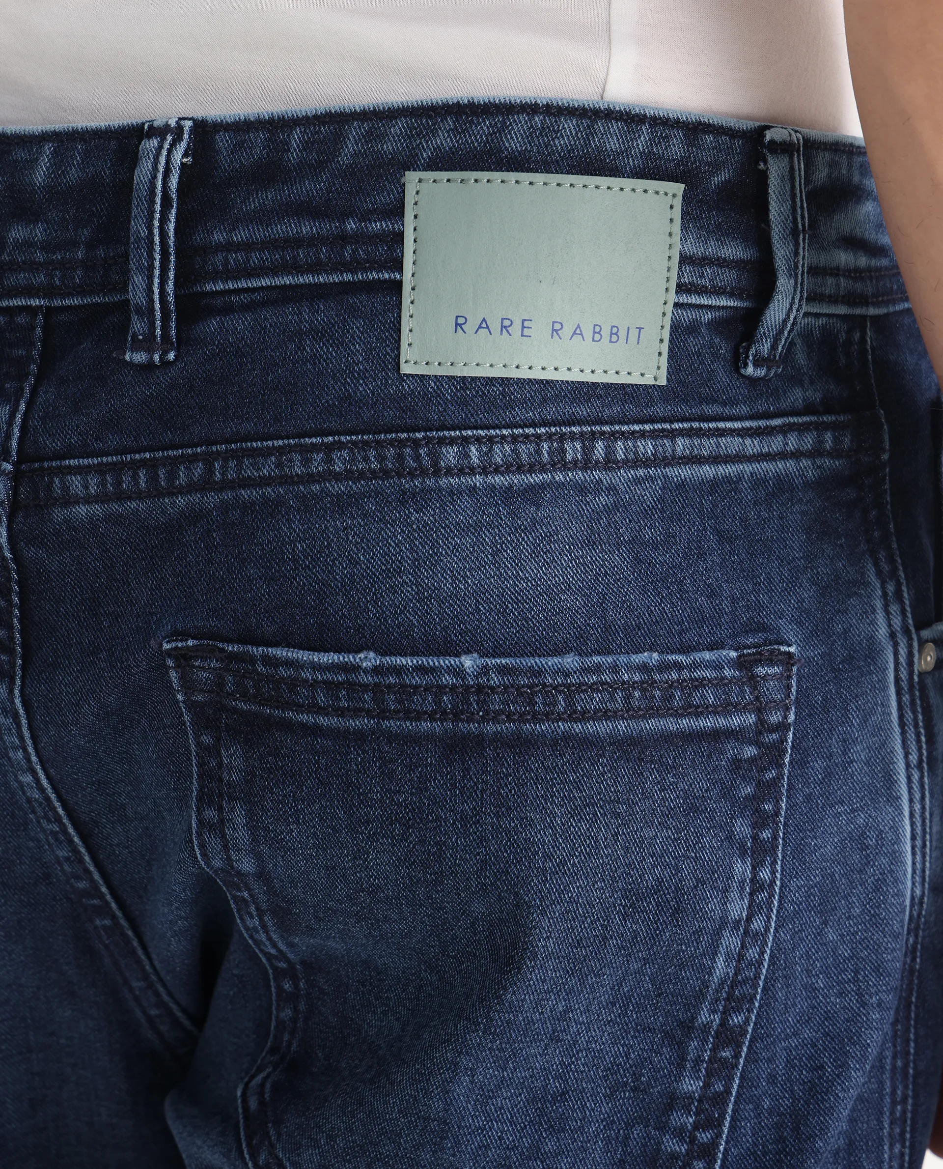 Rare Rabbit Men's Sam-2 Dusky Blue Cotton Plain Kurt Carrot Fit Jeans - Image 8