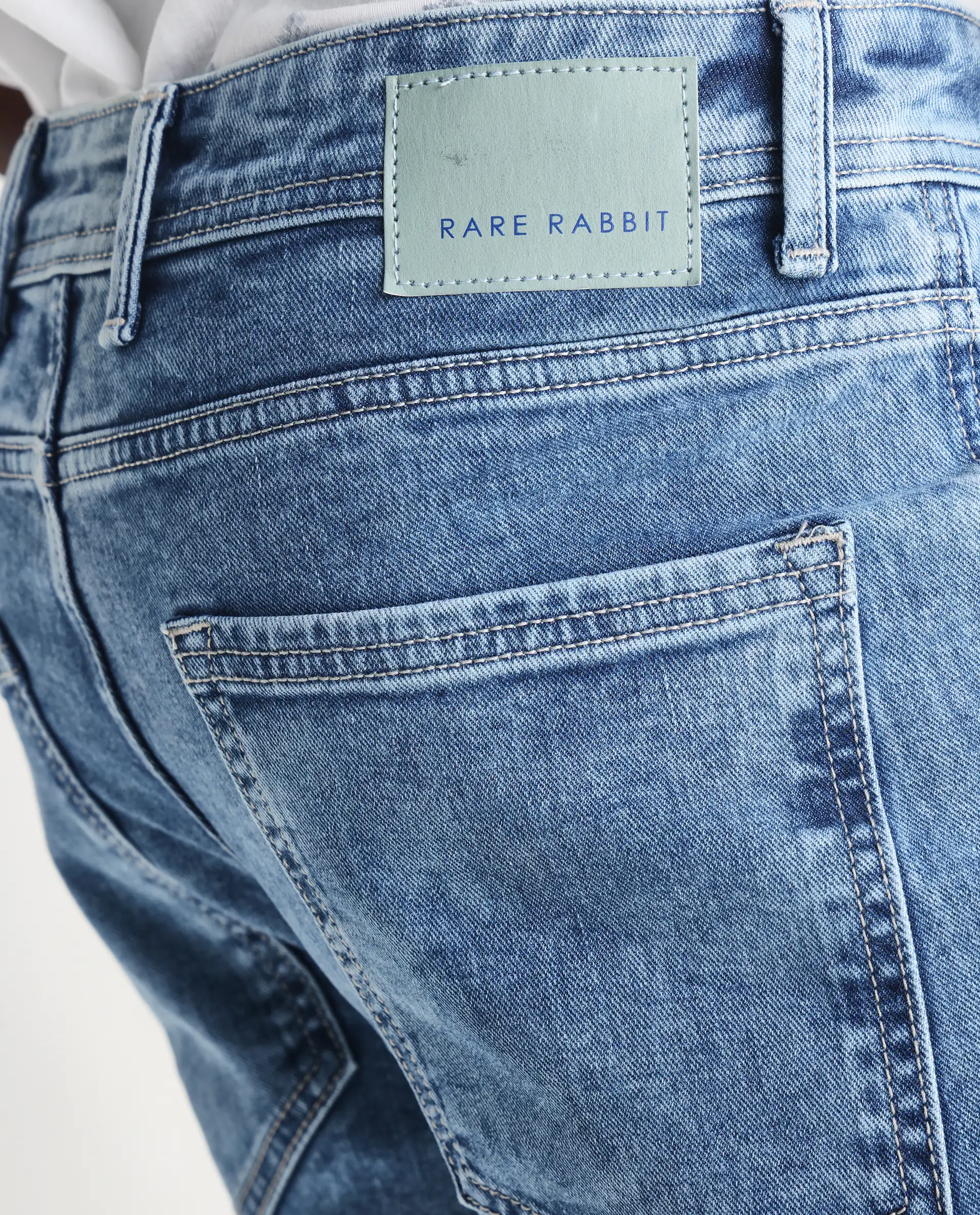 Rare Rabbit Men's Sam-2 Light Blue Cotton Plain Kurt Carrot Fit Jeans - Image 8