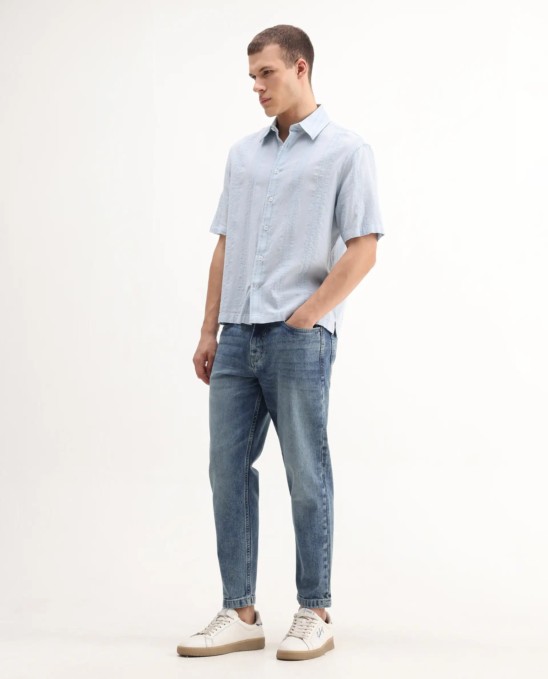 Rare Rabbit Men's Sam Blue Cotton Plain Kurt Carrot Fit Jeans - Image 8