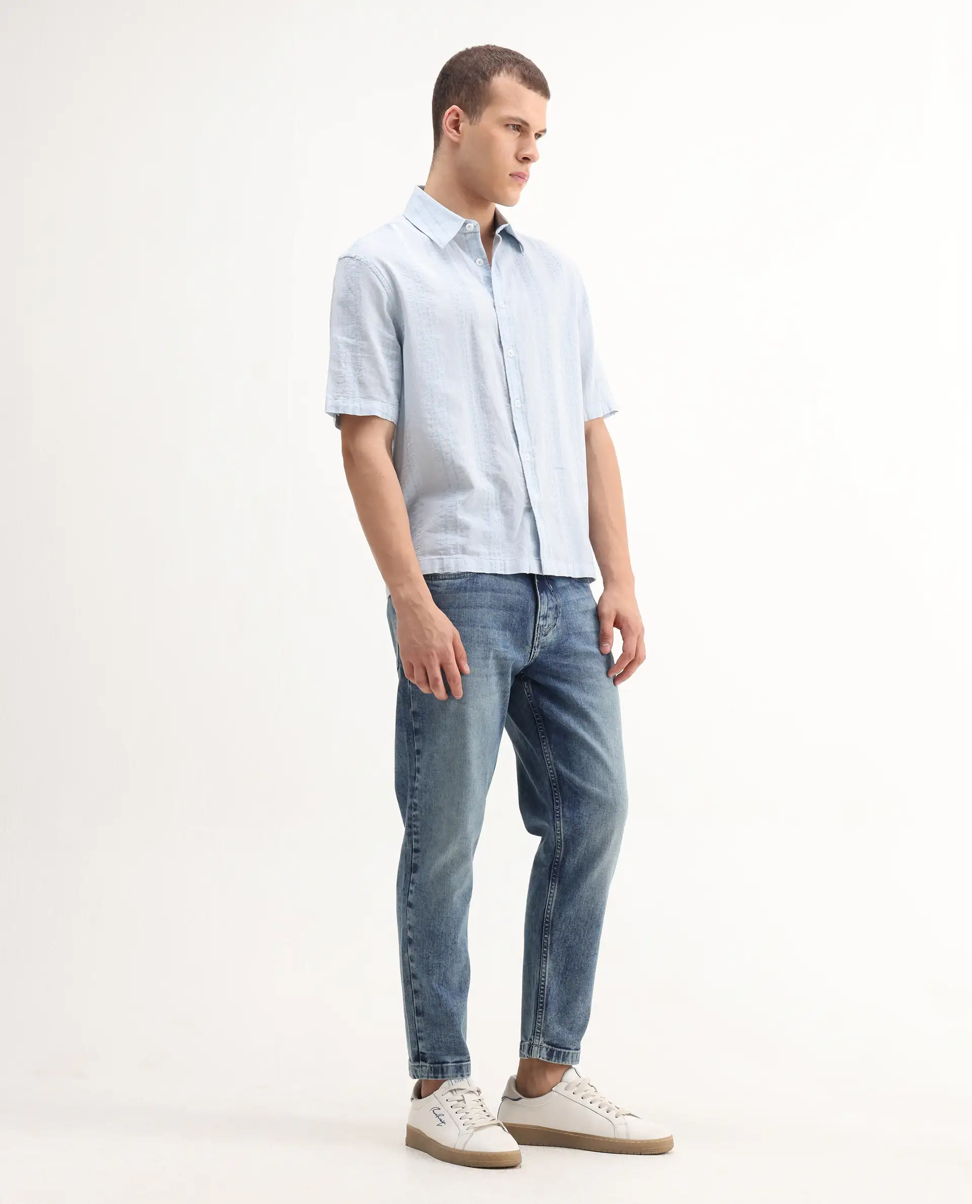 Rare Rabbit Men's Sam Blue Cotton Plain Kurt Carrot Fit Jeans - Image 9