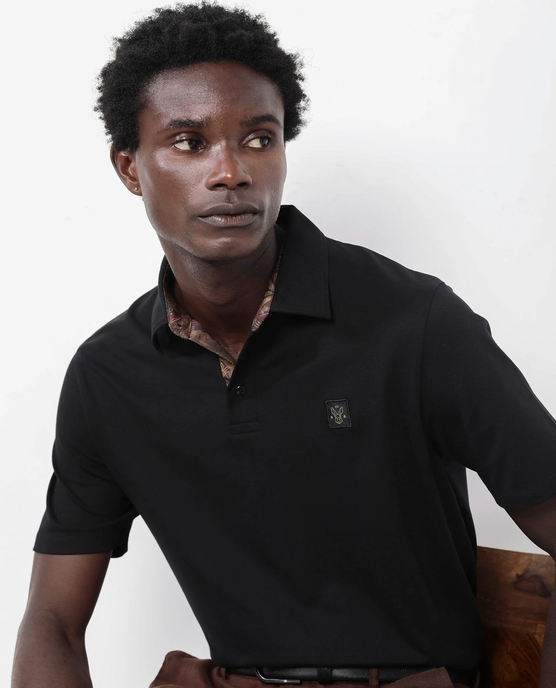 Rare Rabbit Men's Spencer Black Cotton Plain Regular Fit Half Sleeve Polo