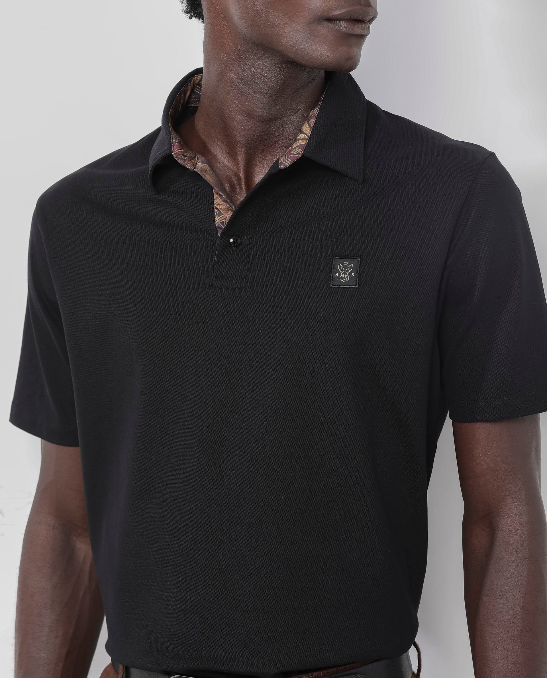 Rare Rabbit Men's Spencer Black Cotton Plain Regular Fit Half Sleeve Polo - Image 4