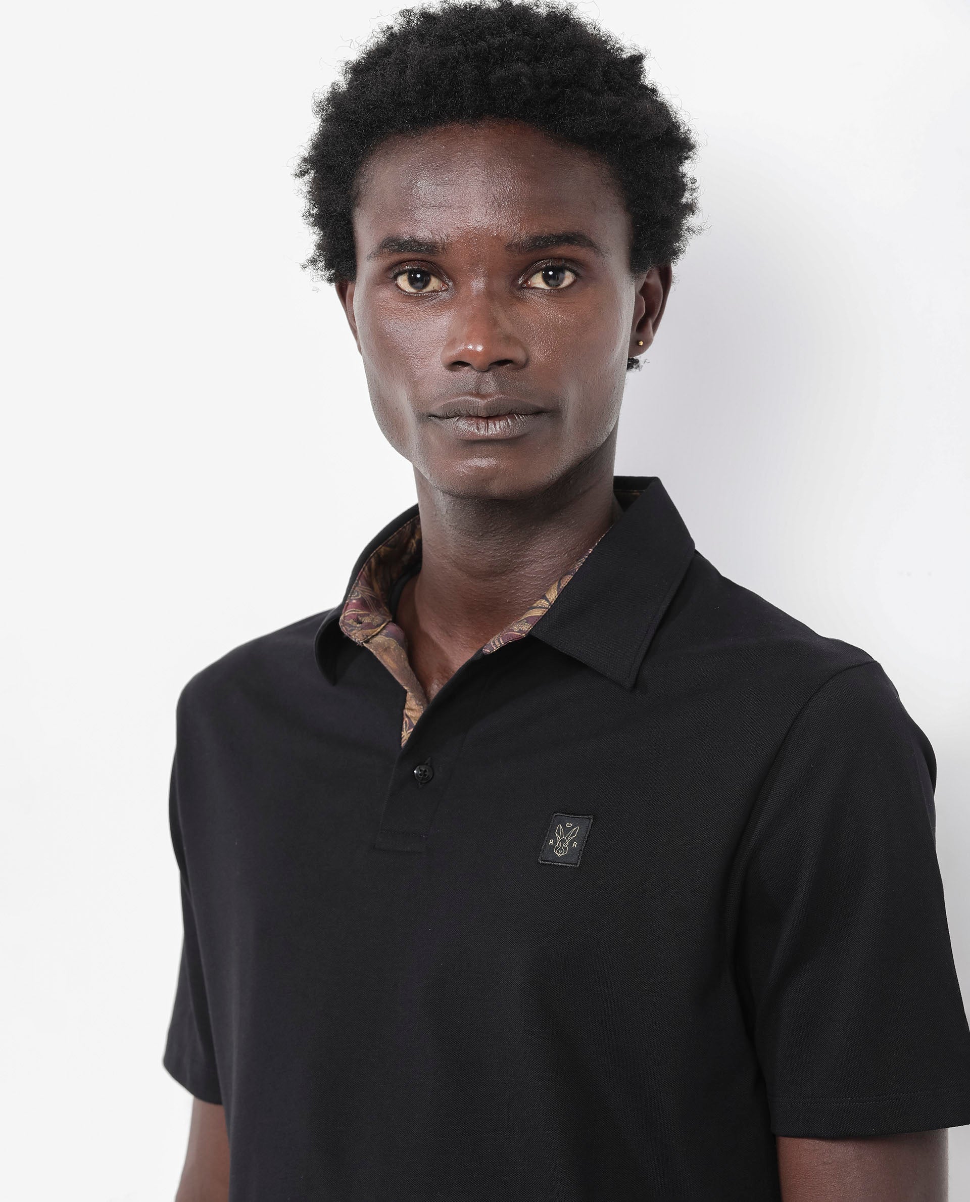 Rare Rabbit Men's Spencer Black Cotton Plain Regular Fit Half Sleeve Polo - Image 5