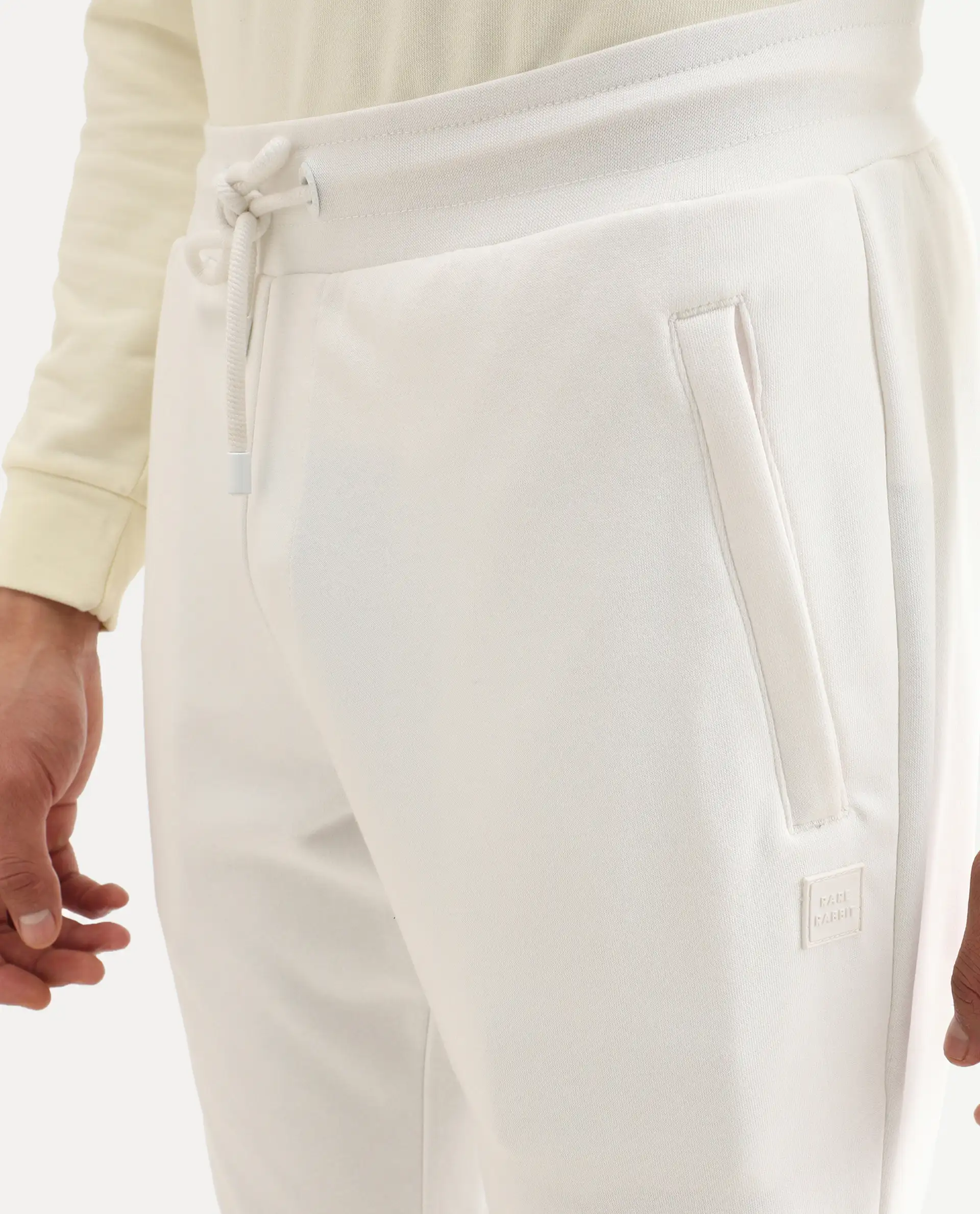 Rare Rabbit Men's Toyo Off White Cotton Plain Regular Fit Joggers - Image 4