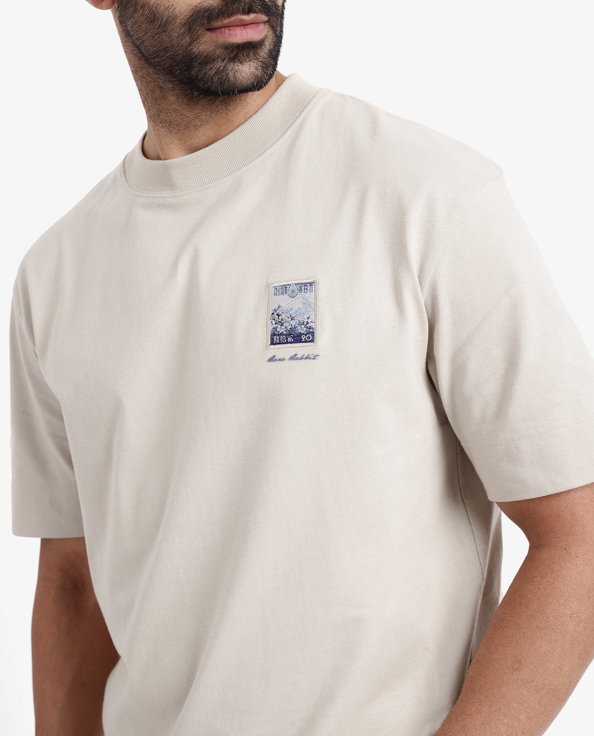 Rare Rabbit Men's Trams Beige Cotton Graphic Print Oversized Fit Half Sleeve Crew Neck T-Shirt - Image 7