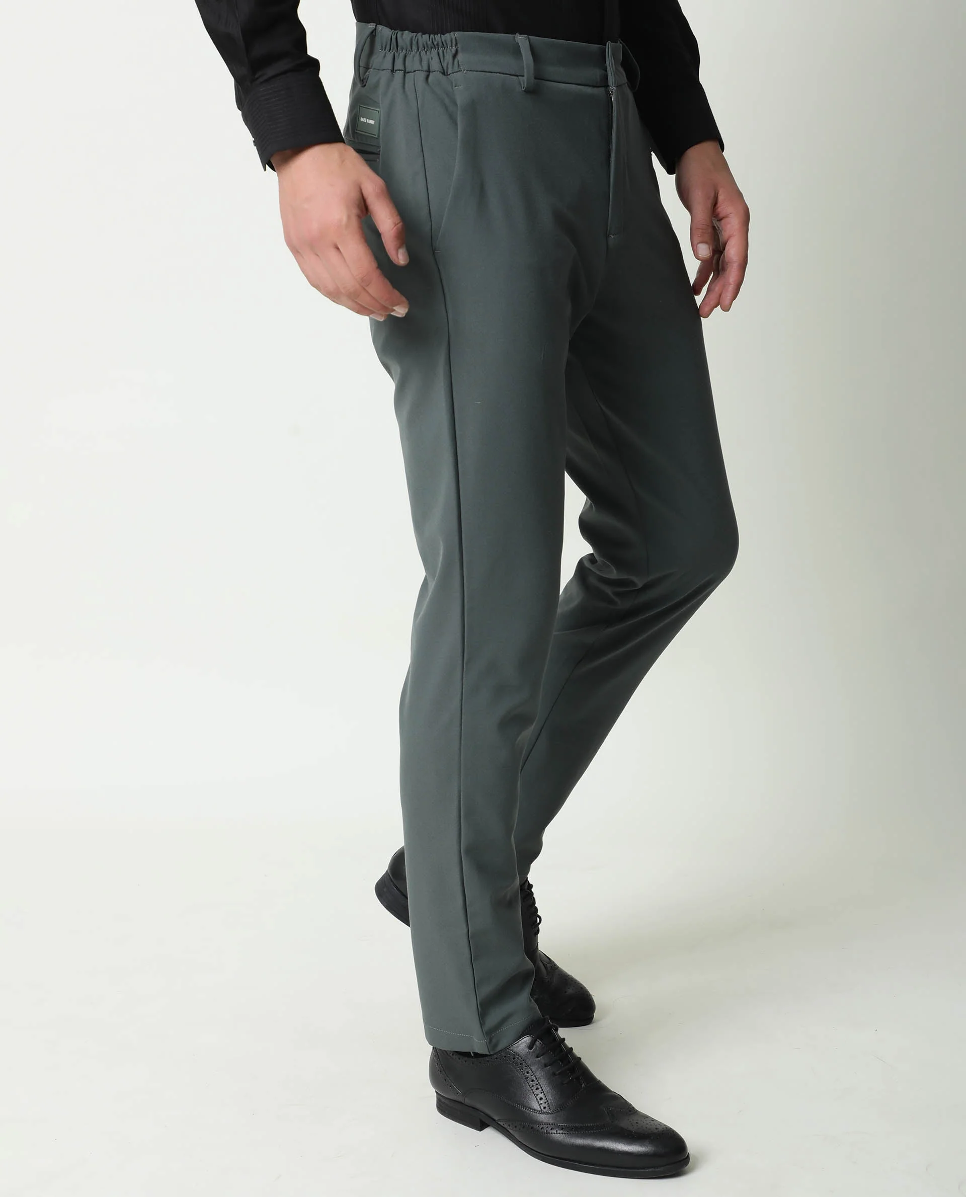 Rare Rabbit Men's Travel-1 Olive Solid Mid-Rise 4-Way Stretch Slim Fit Trouser - Image 4