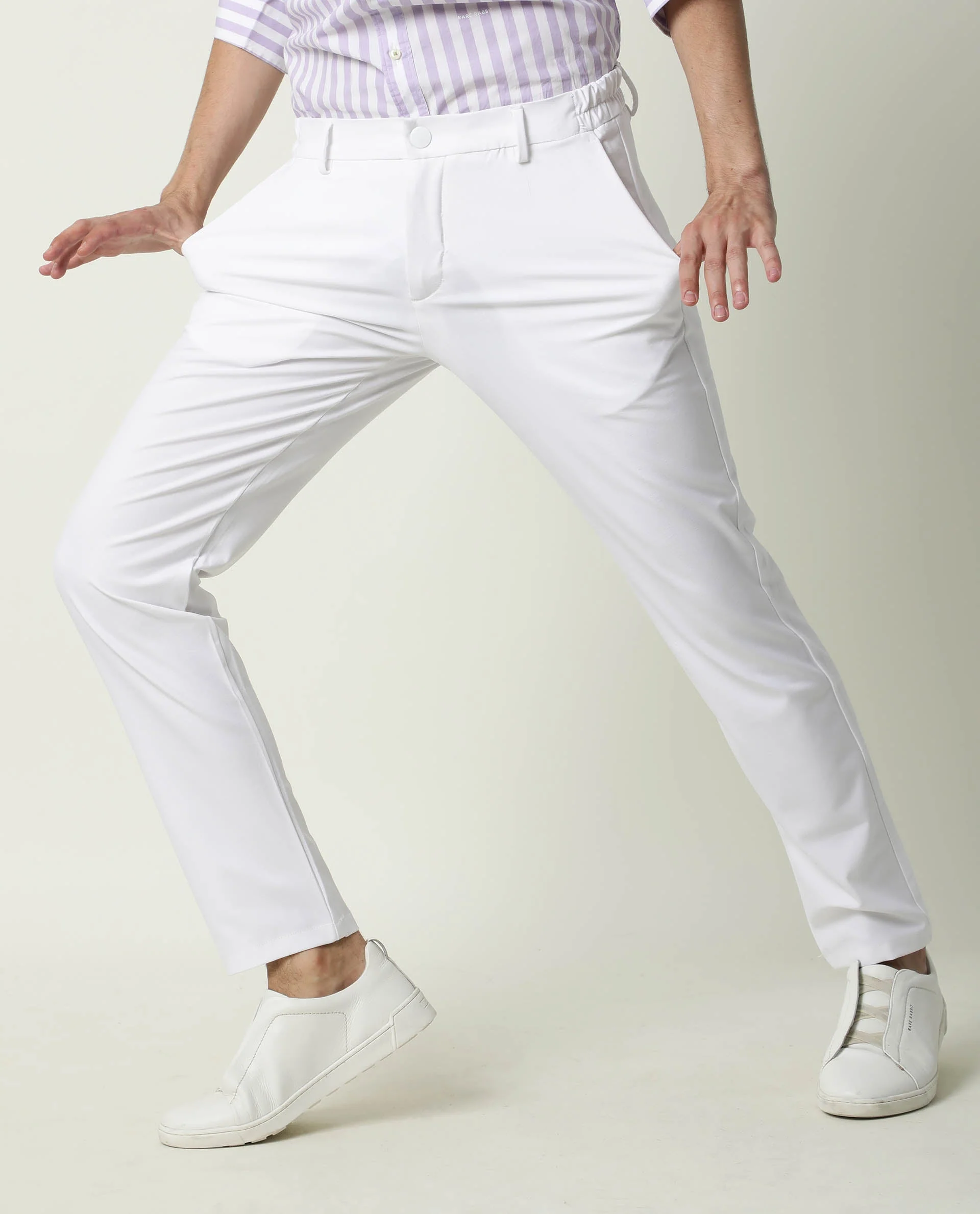 Rare Rabbit Men's Travel-1 White Solid Mid-Rise 4-Way Stretch Slim Fit Trouser - Image 6