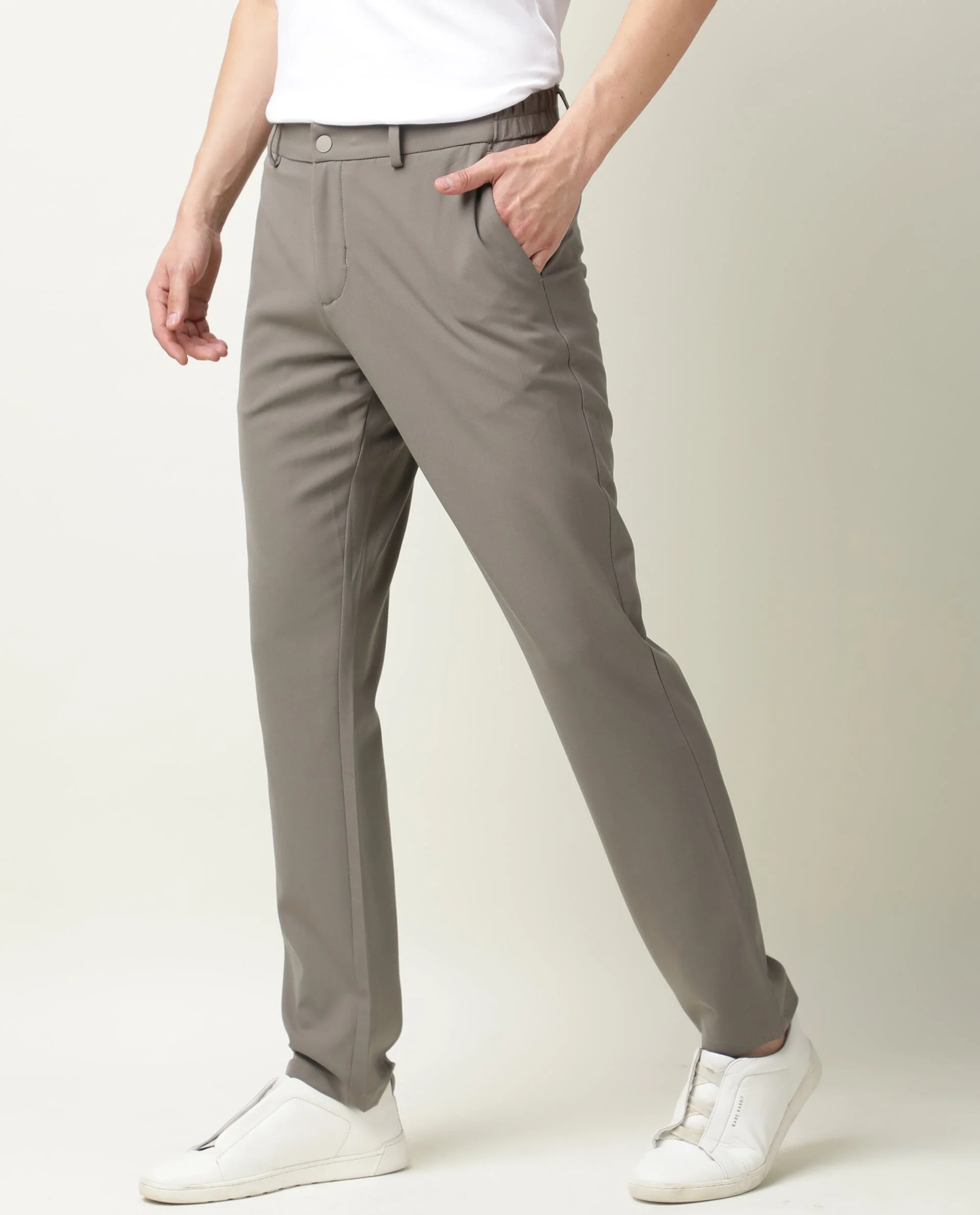 Rare Rabbit Men's Travel-2 Beige Solid Mid-Rise Slim Fit Stretch Trousers - Image 3