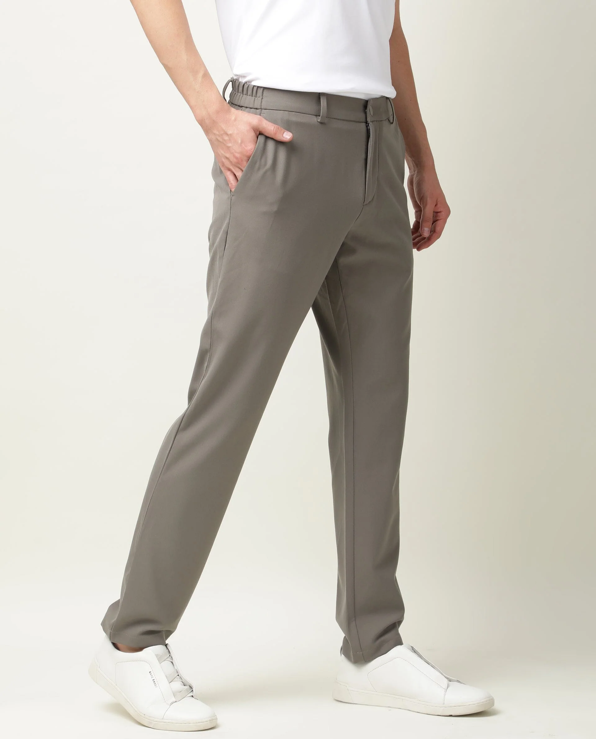 Rare Rabbit Men's Travel-2 Beige Solid Mid-Rise Slim Fit Stretch Trousers - Image 4