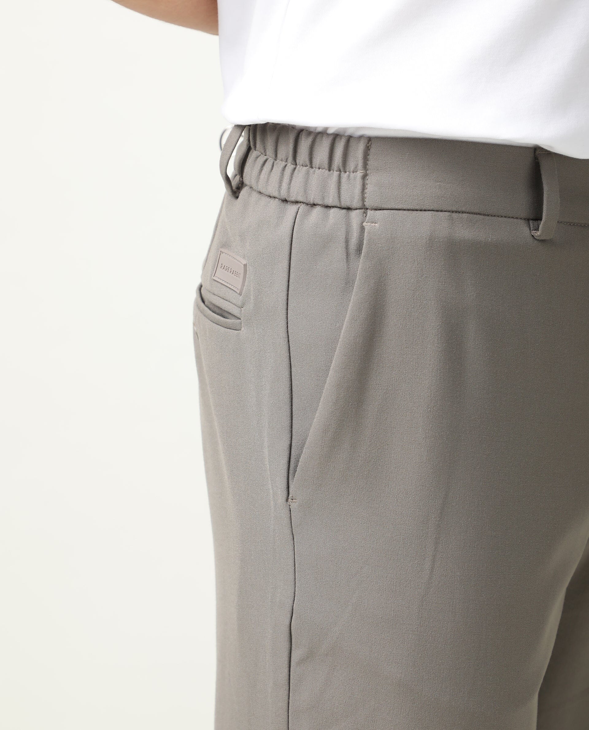 Rare Rabbit Men's Travel-2 Beige Solid Mid-Rise Slim Fit Stretch Trousers - Image 5