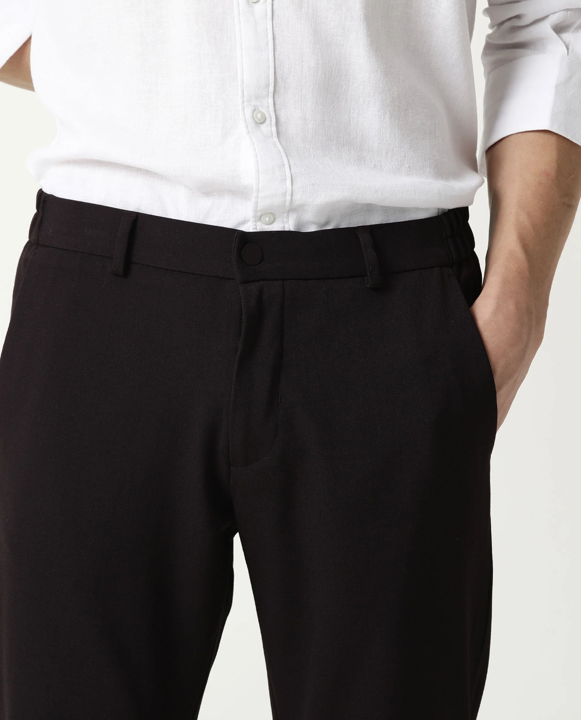 Rare Rabbit Men's Travel-2 Maroon Solid Mid-Rise Slim Fit Stretch Trousers - Image 4