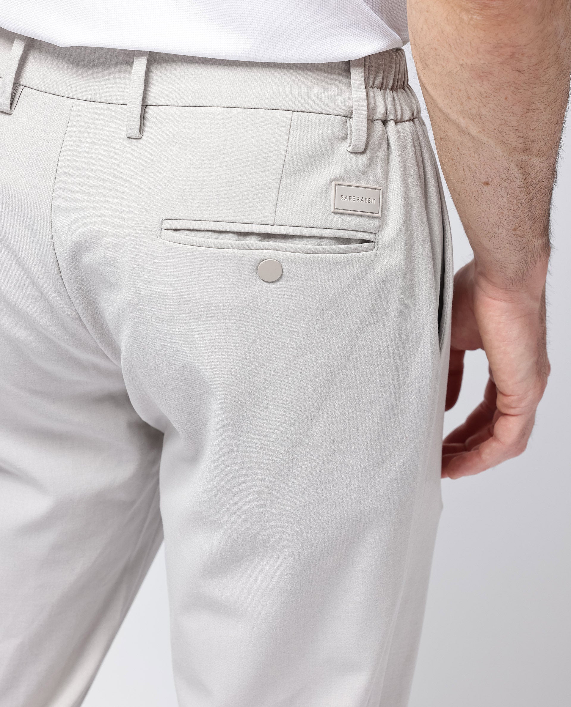 Rare Rabbit Men's Travel-24 Light Beige Poly Viscose Lycra Fabric Blend Solid Trousers - Image 4