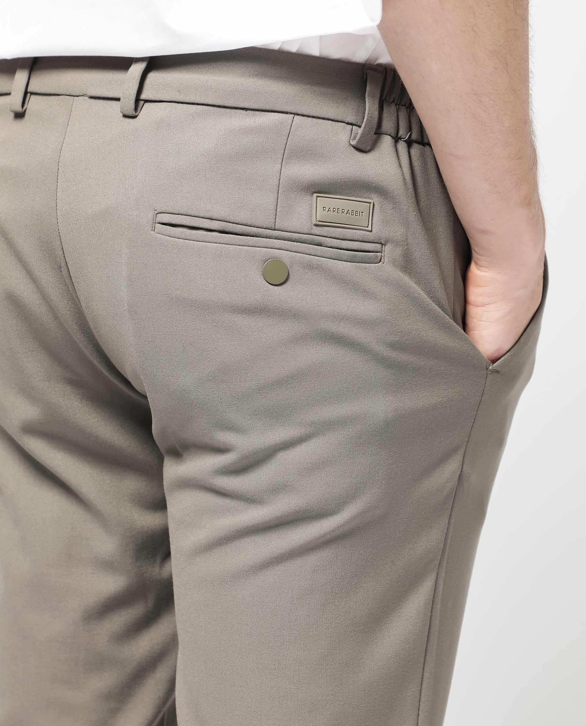 Rare Rabbit Men's Travellers Dark Beige Solid Mid-Rise Regular Fit Trouser - Image 5
