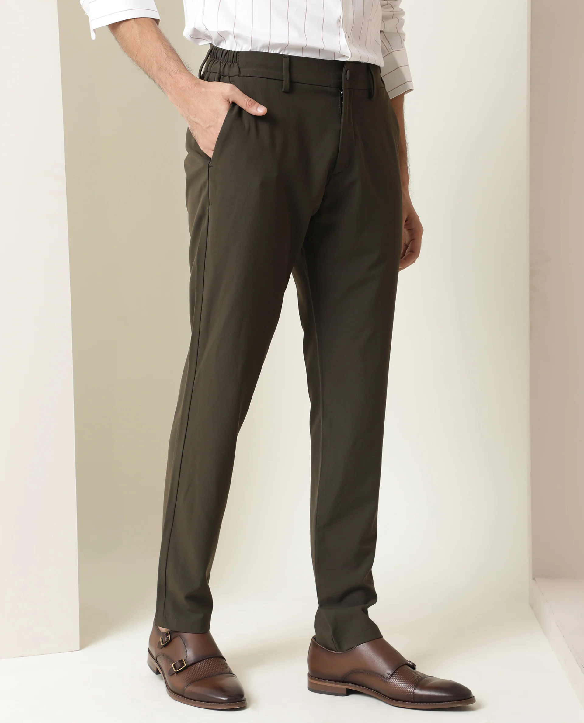 Rare Rabbit Men's Traverse Olive Solid Mid-Rise Regular Fit Stretch Trouser - Image 5