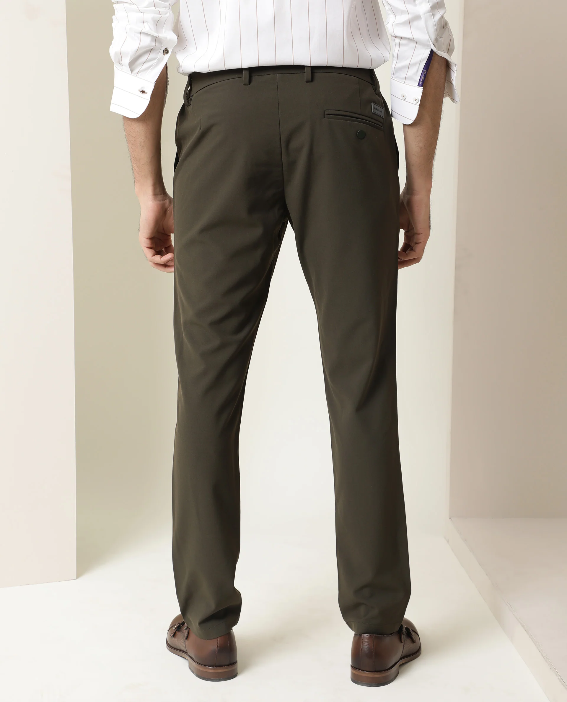 Rare Rabbit Men's Traverse Olive Solid Mid-Rise Regular Fit Stretch Trouser - Image 7