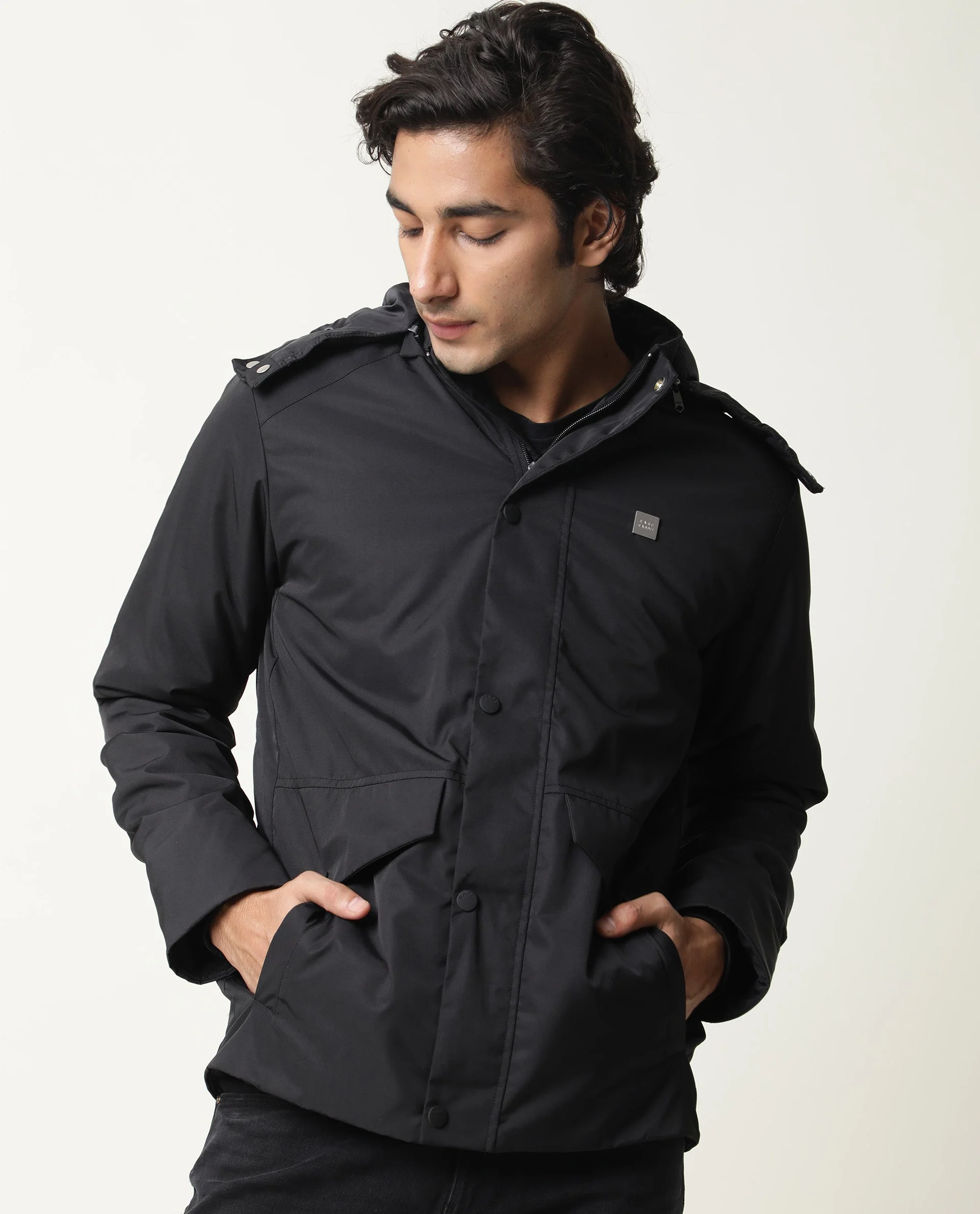 Rare Rabbit Men's Venue Black Polyester Plain Regular Fit Full Sleeve Hooded Jacket