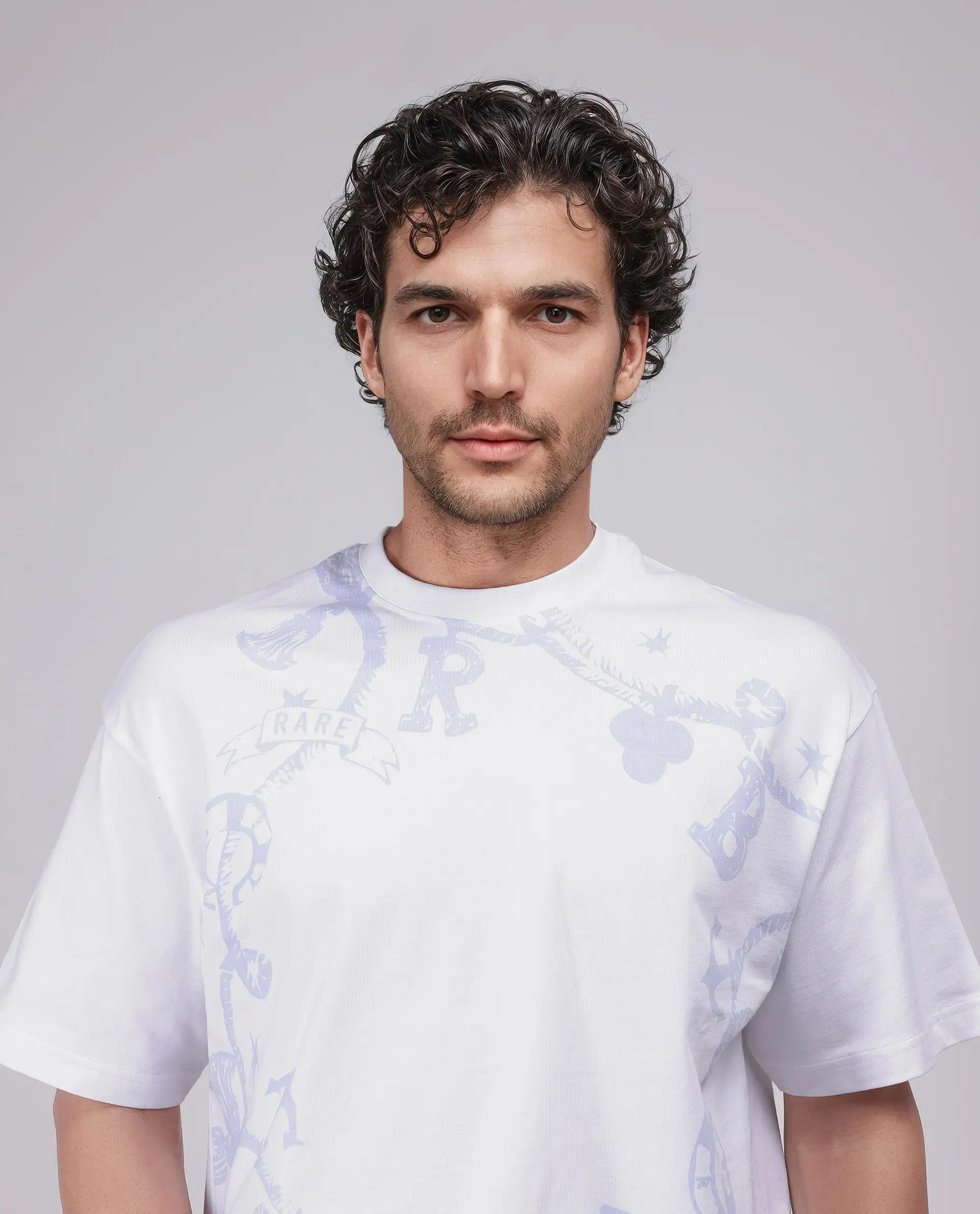 Rare Rabbit Men's Xab White Cotton Graphic Print Oversized Fit Half Sleeve Crew Neck T-Shirt - Image 8