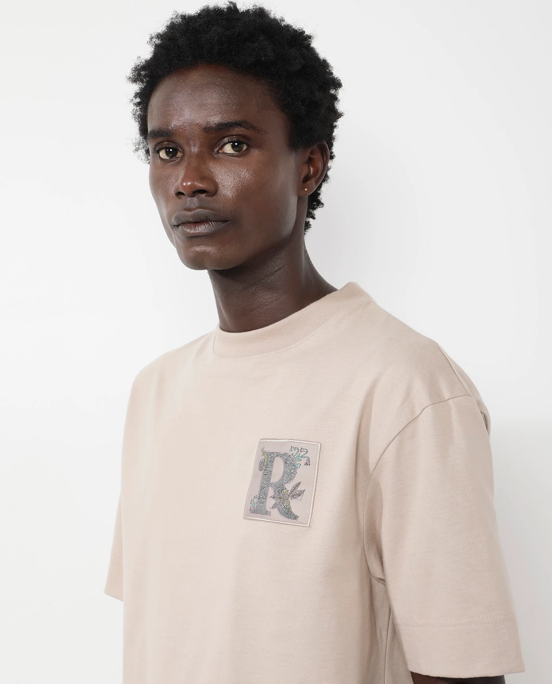 Rare Rabbit Articale Mens Yates Dusky Beige Cotton Polyester Fabric Short Sleeve Crew Neck Oversized Fit Graphic Print T-Shirt - Image 5